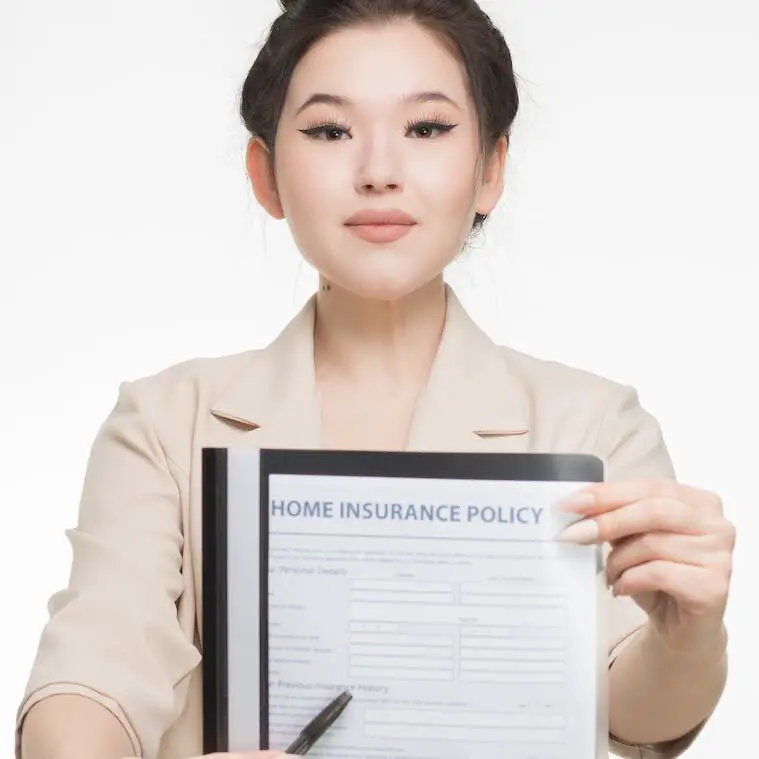 Asian Woman holding Home Insurance Policy: What is an Independent Adjuster?